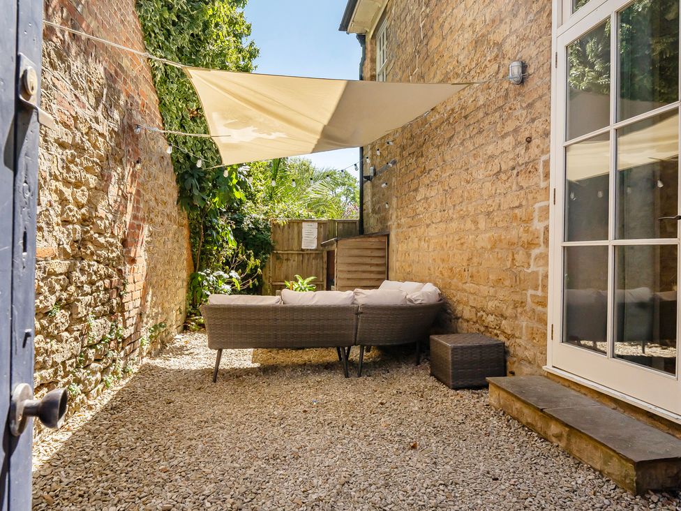 A garden area with outdoor furniture at East Wing in Crewkerne