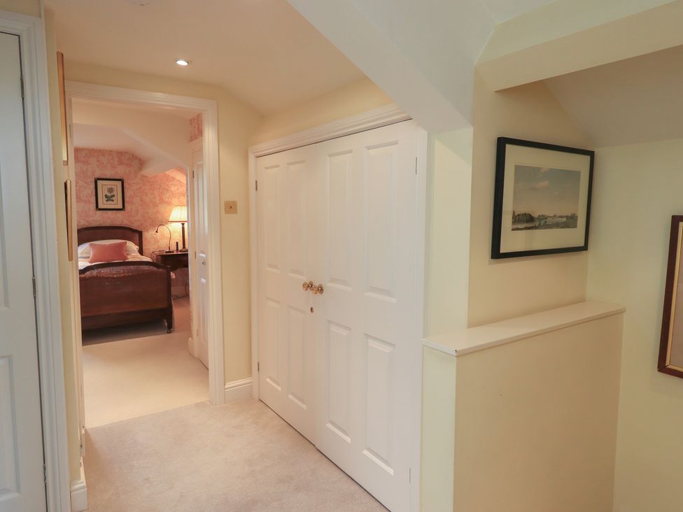 A hallway leading to a bedroom at The Garden Rooms Lawkland in Austwick