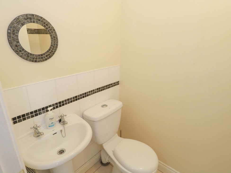A bathroom with a sink and toilet at Aisling in Foxford near Ballina, County Mayo