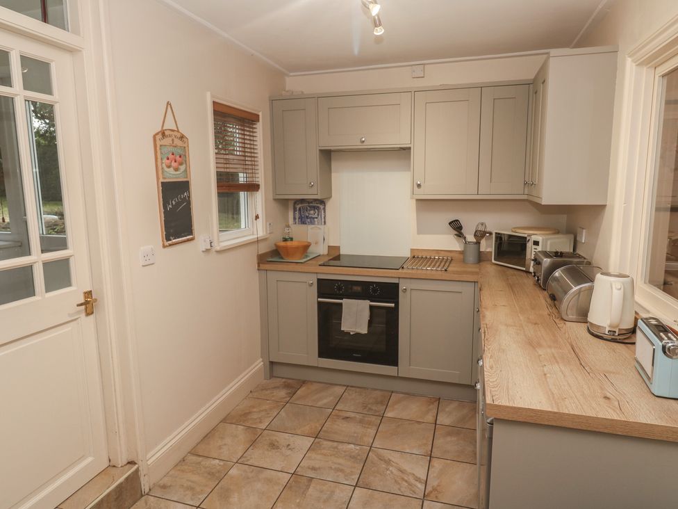 A kitchen with modern appliances at Banneth in Helford
