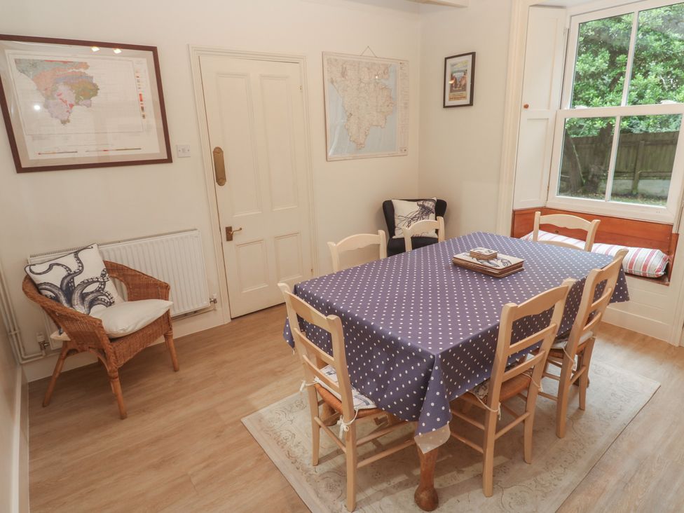 A dining room with a table and chairs at Banneth Helford
