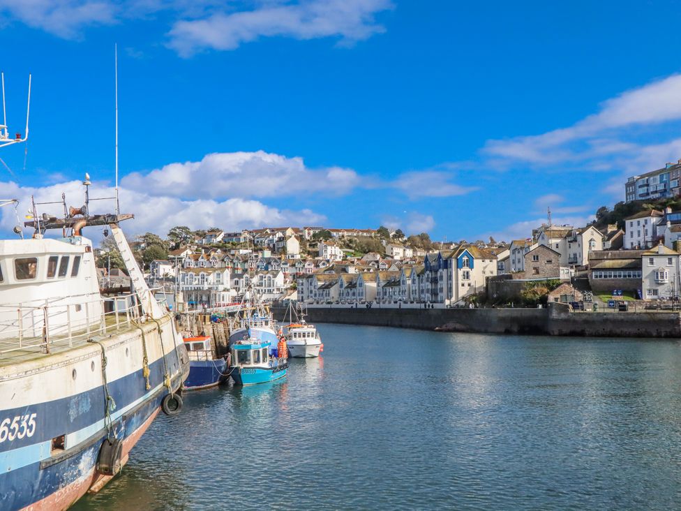 A harbor with boats and buildings at Blue Horizon in Brixham