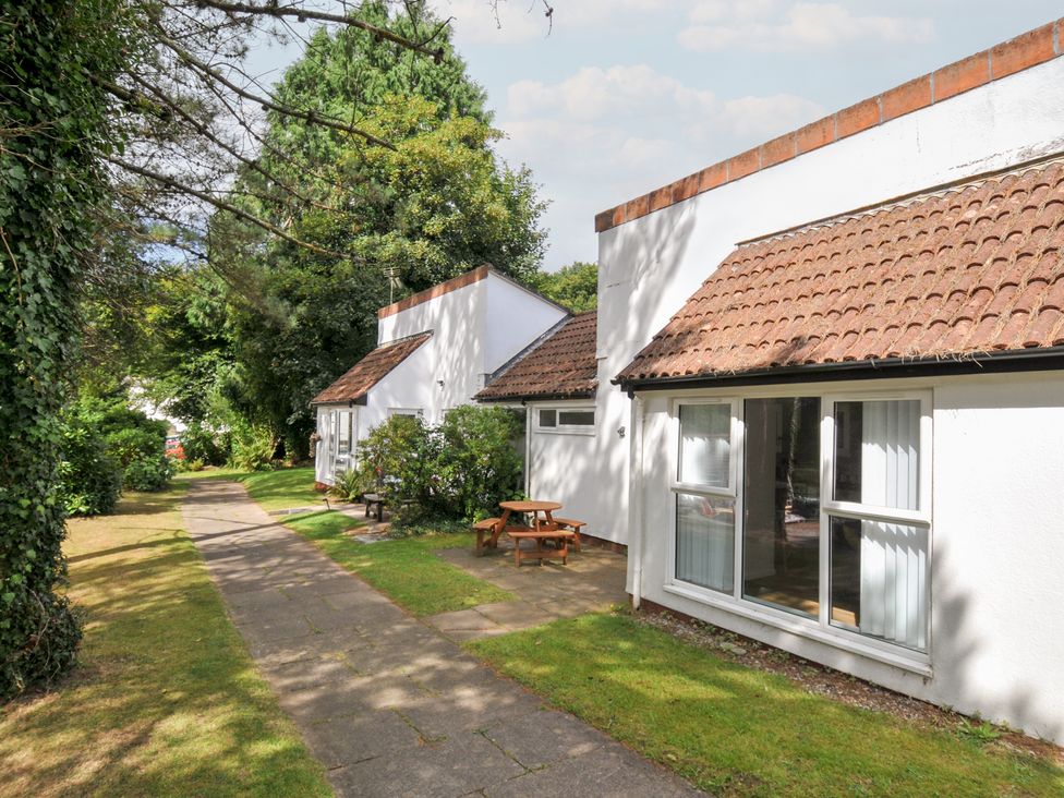 Two cottages with pathway and seating at Manorcombe 2 Callington