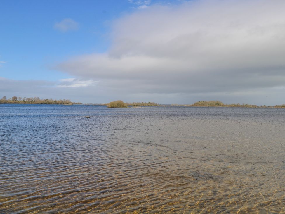A body of water with islands in the distance at Castle View in Oughterard, County Galway