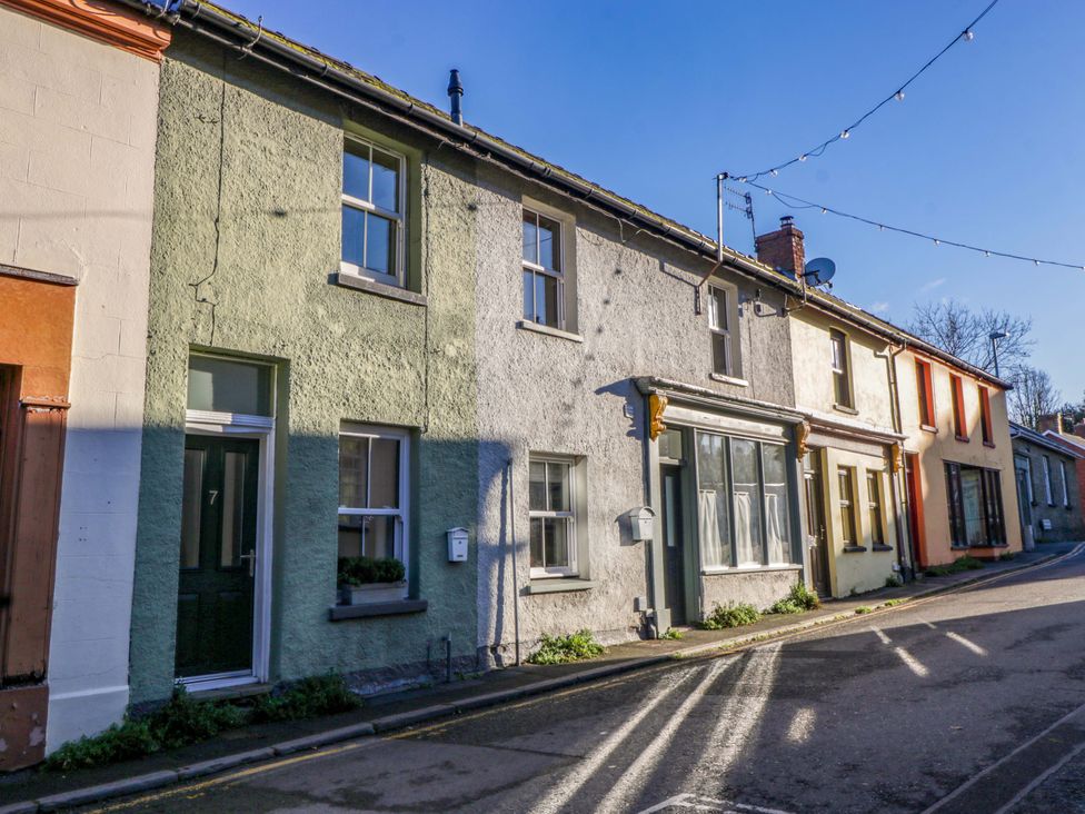 A row of houses with doors and windows at 7 Bell Street in Talgarth