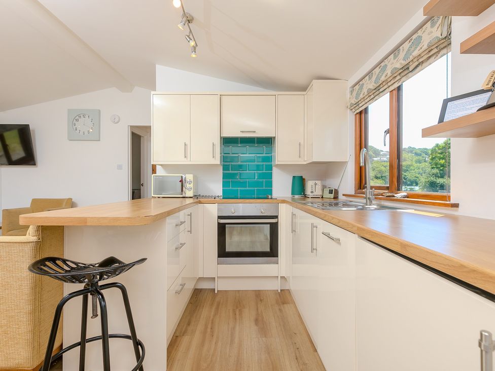 A kitchen with modern appliances at Costentyn, Tor Down Quarry St Breward