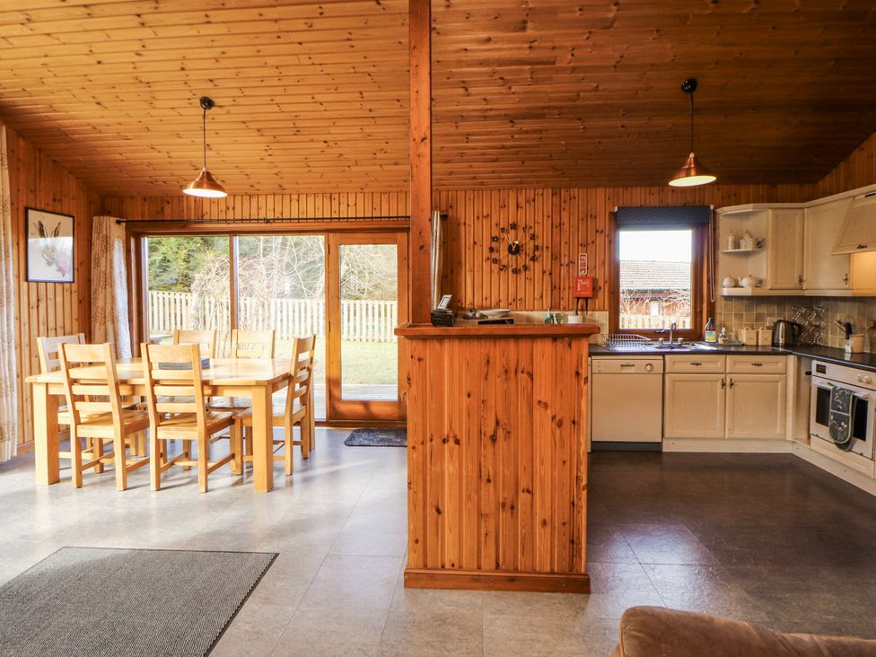 A kitchen with dining area and appliances at 26 Dukes Meadow Greystoke near Penrith