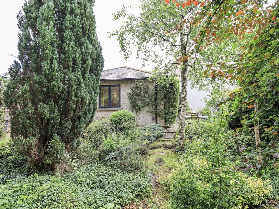 A house surrounded by greenery at Doe Foot Cottage Ingleton