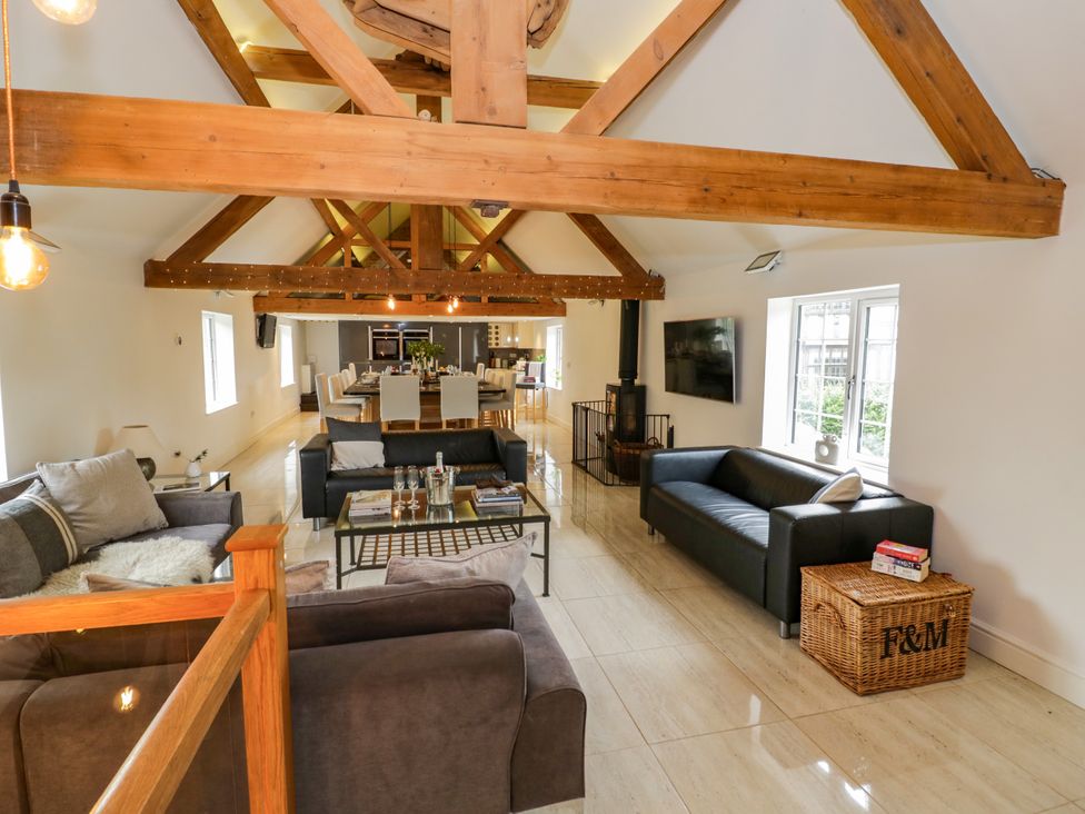 A living room with sofas and a coffee table at Lower Tundridge Cottage Suckley near Malvern