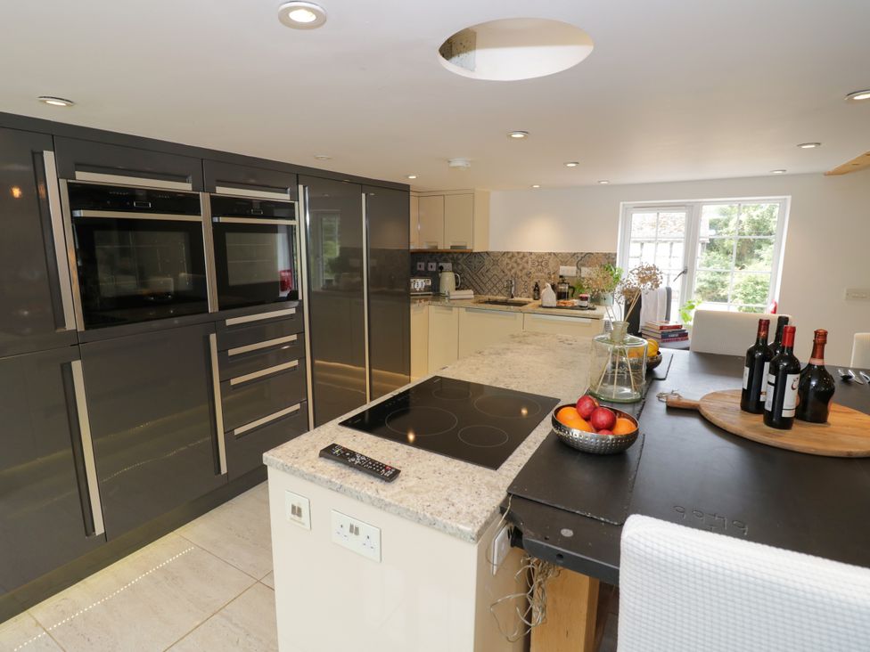A kitchen with modern appliances and an island at Lower Tundridge Cottage Suckley near Malvern