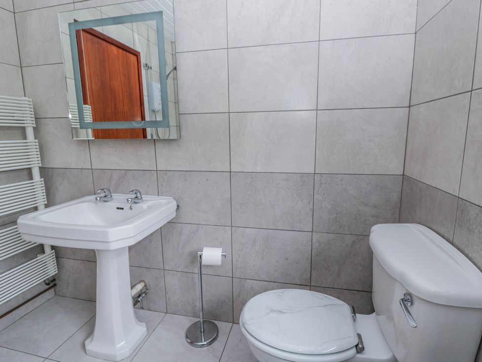 A bathroom with a sink and toilet at Blaenywawr near Lampeter