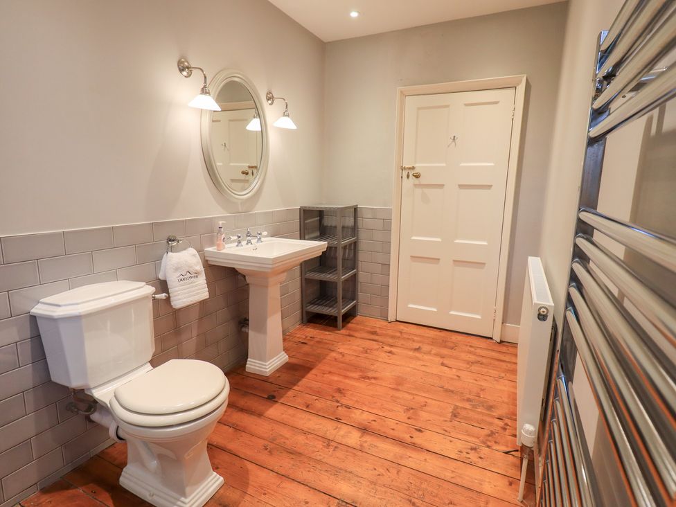 A bathroom with a sink and toilet at Little Ellers Portinscale near Keswick