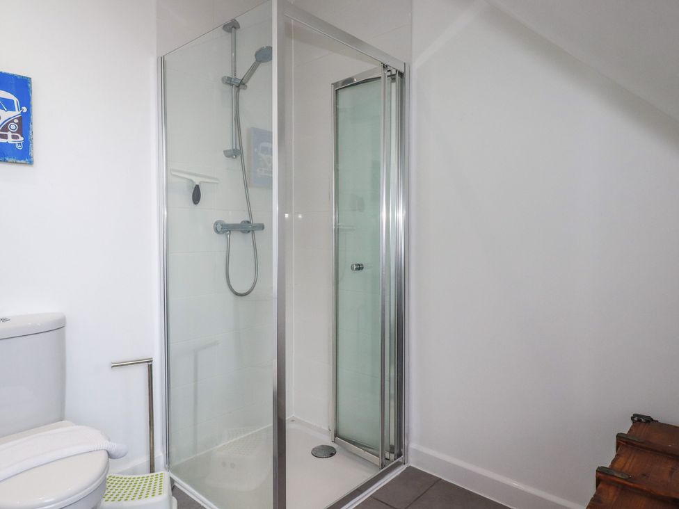 A bathroom with a shower and toilet at The View in Newquay