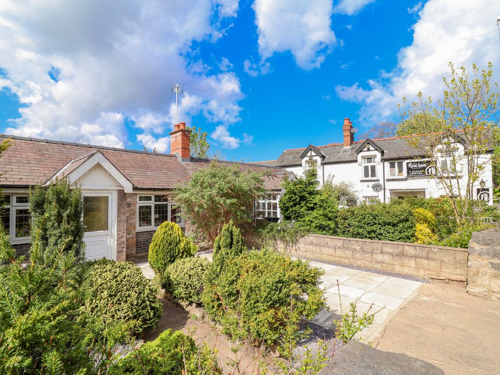 A house with garden and pathway at Riverlea in Dyserth