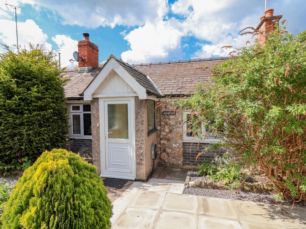 An entrance to a house with greenery at Riverlea in Dyserth