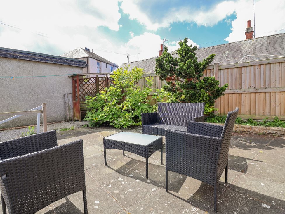 A patio with furniture at Riverlea in Dyserth