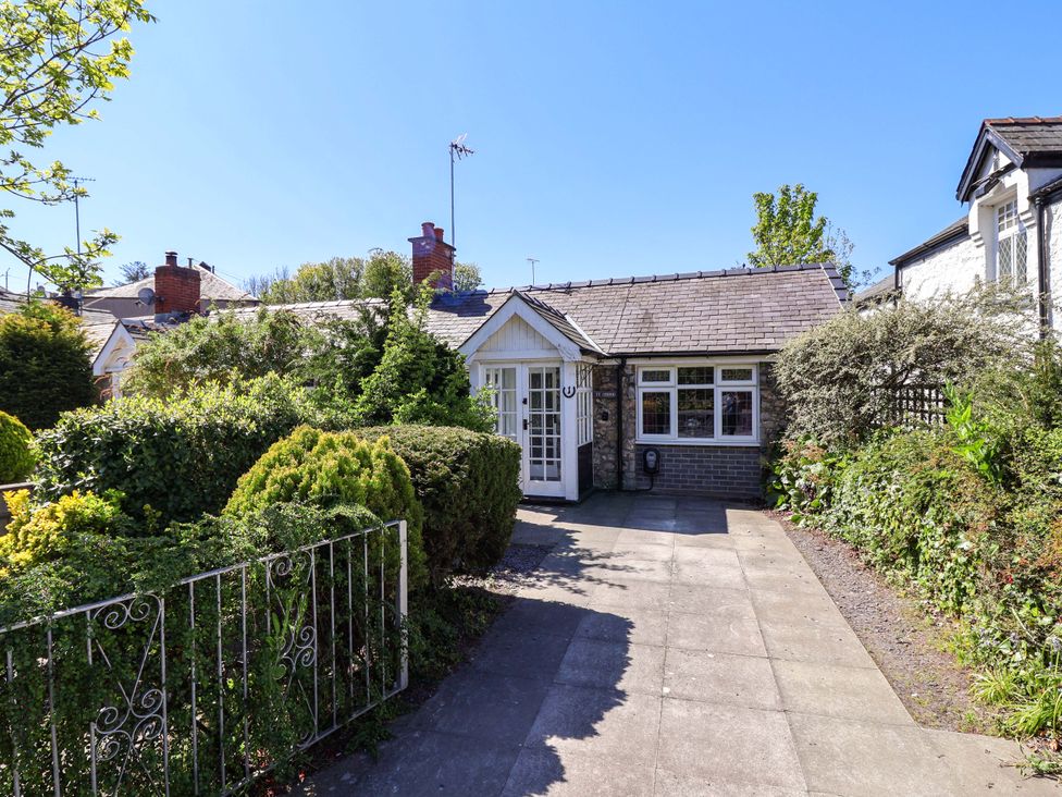 A front view of a house with garden at Ty Cerrig Dyserth