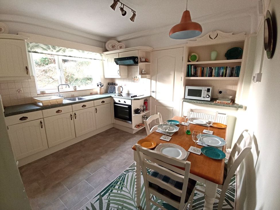 A kitchen with a table set for dining at Dubrovnik