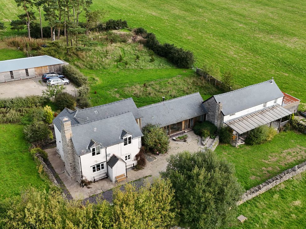 A house with a garage and garden space at Pant Dafydd Goch in Llangollen
