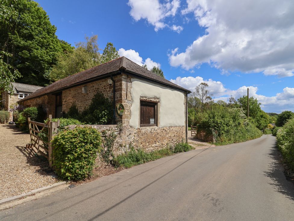 A stone building beside a road at Pottery Barn in Branscombe
