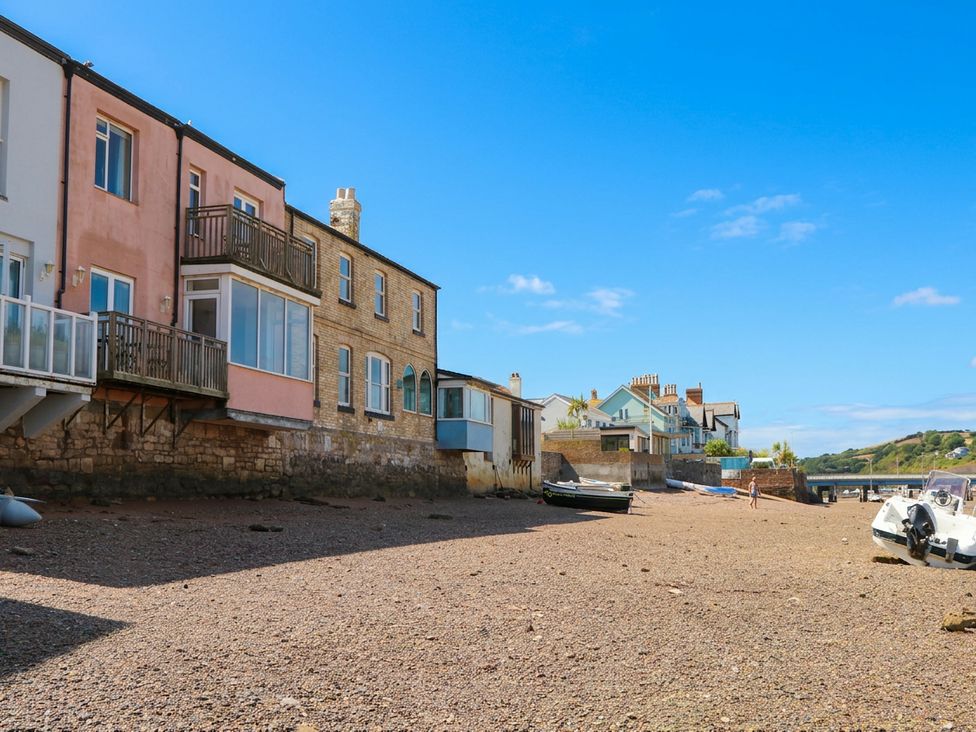 A view of houses by the beach at The Dolphins in Shaldon