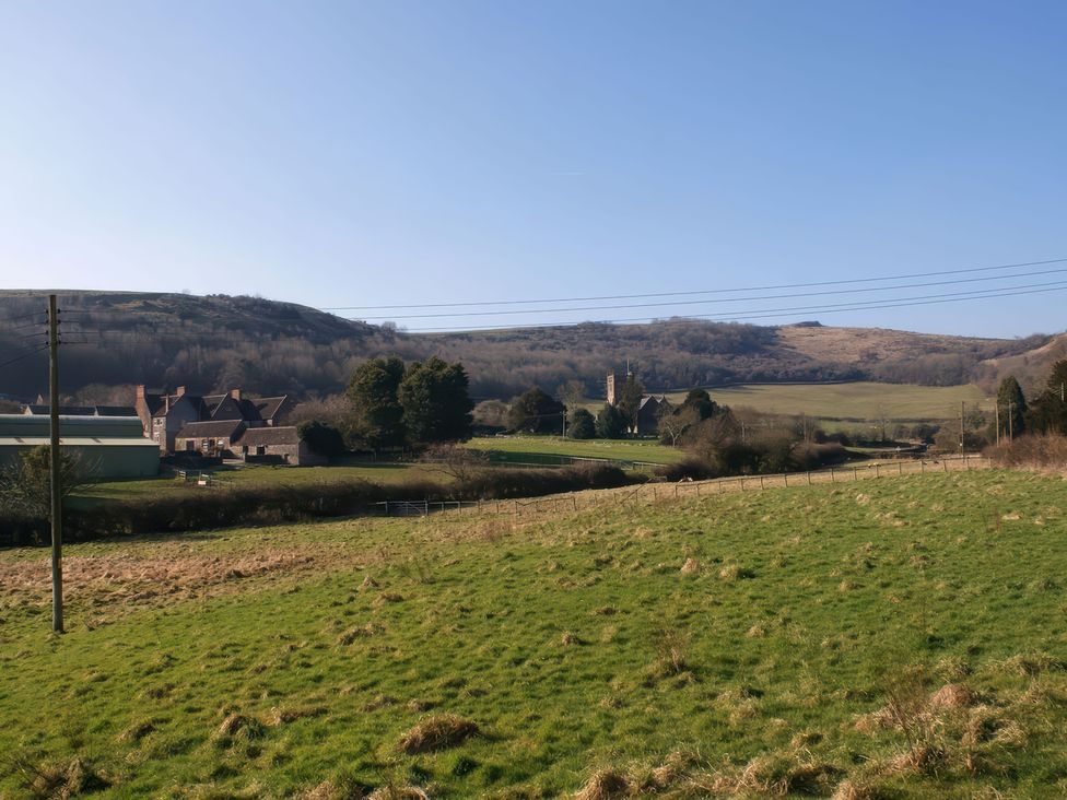 A rural landscape with fields and hills at The Barn in Compton Bishop, near Cheddar