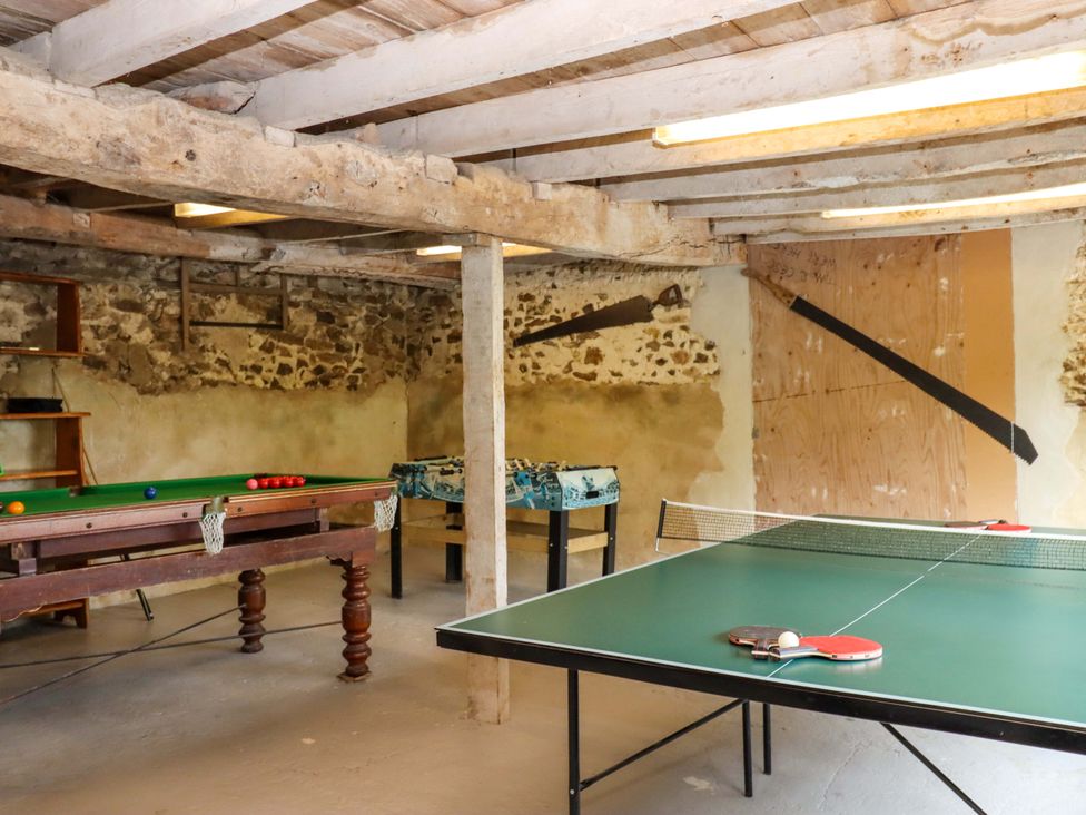 A games room with a pool table and a table tennis table at Hornshayne Farmhouse Farway, near Honiton