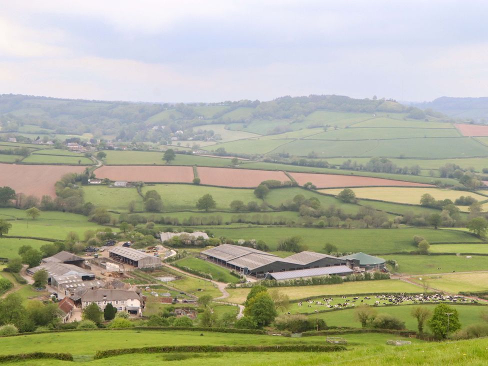 A view of farm buildings and fields at Hornshayne Farmhouse, Farway, near Honiton