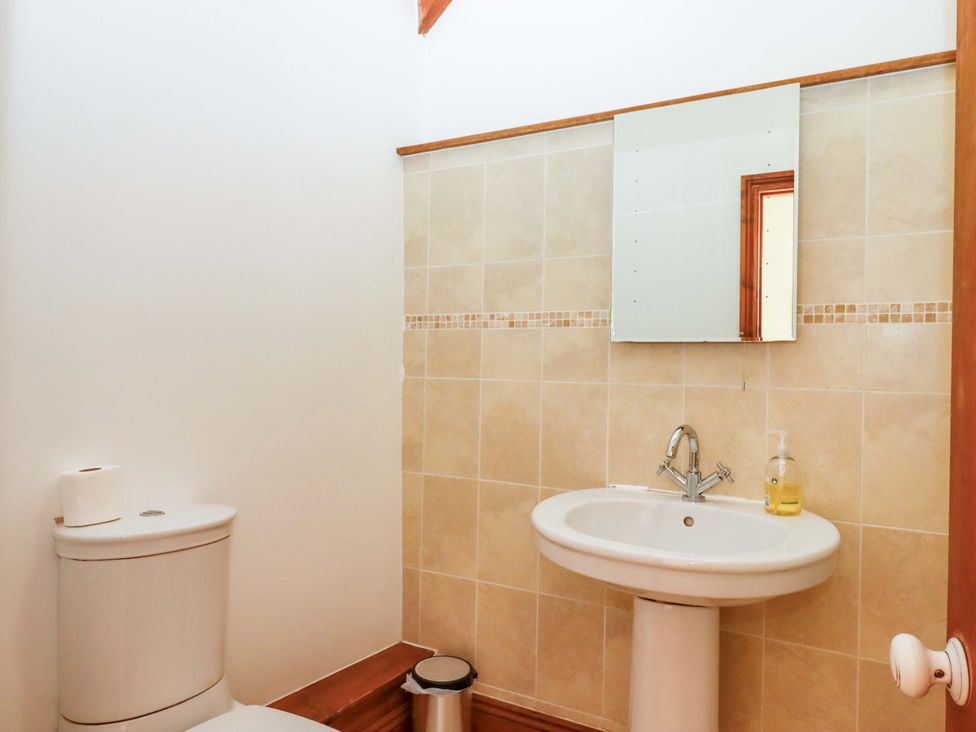 A bathroom with a toilet and sink at East Bickleigh in Halwell