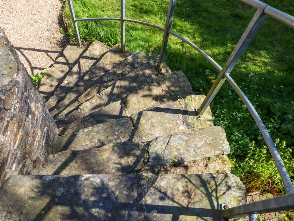 A staircase made of stone leading to grass at East Bickleigh in Halwell