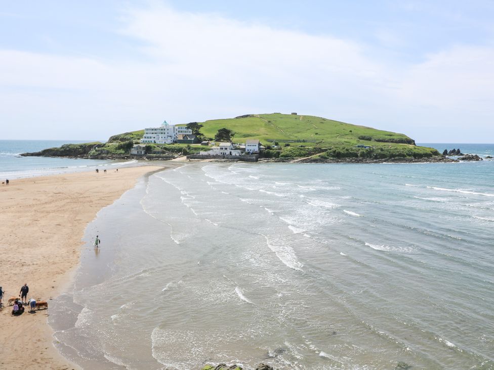 A view of an island with sand and ocean at 27 Burgh Island Causeway in Bigbury-on-Sea