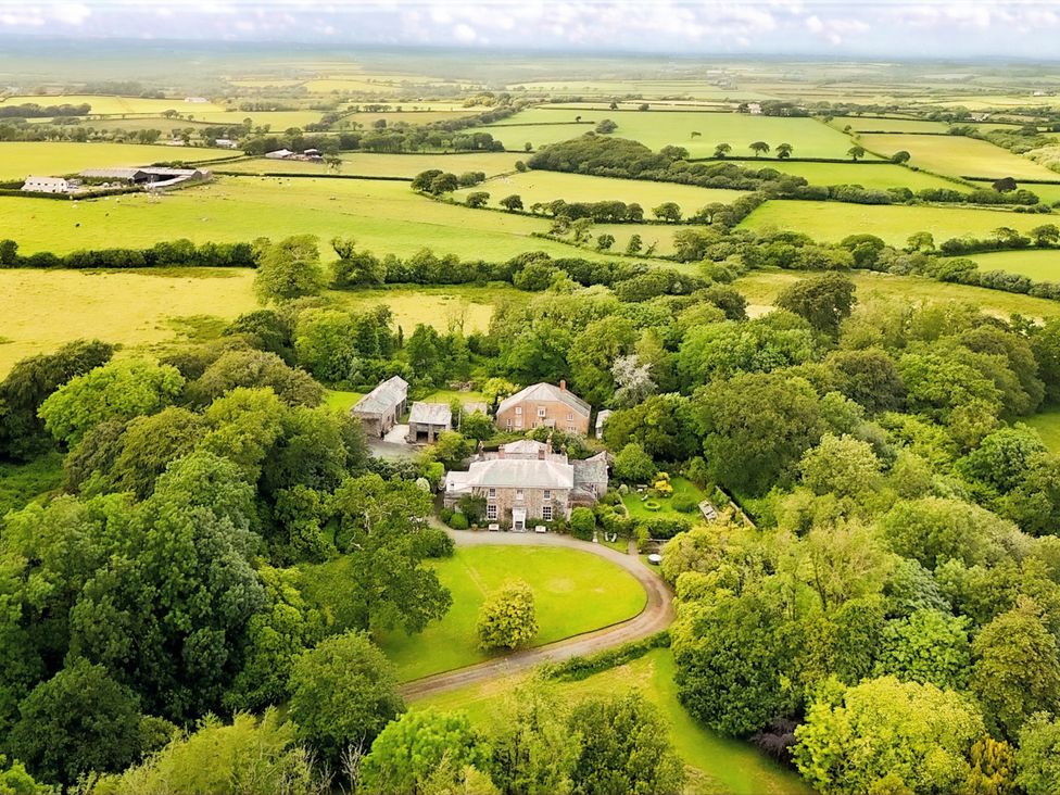 A house surrounded by gardens and fields at Parnacott in Holsworthy