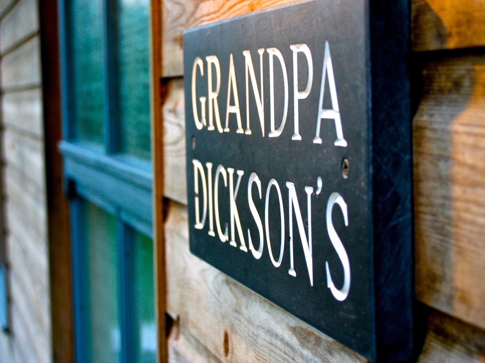 A sign with the name Grandpa Dickson's at Little Petherick
