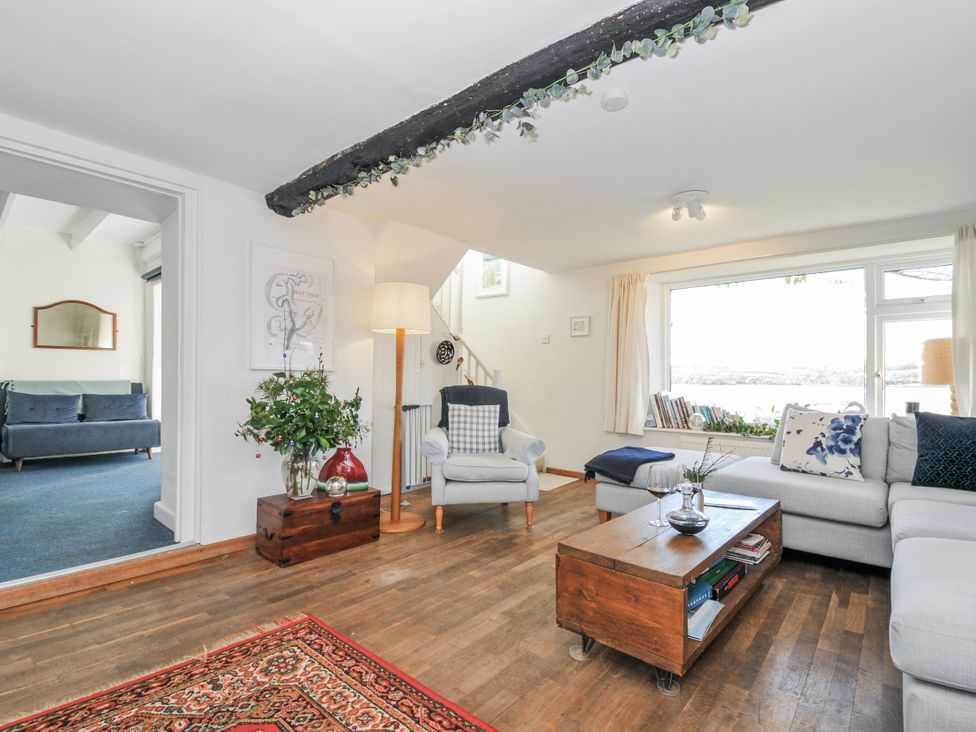 A living room with a coffee table and sofa at Clamoak Cottage in Clamoak near Bere Alston