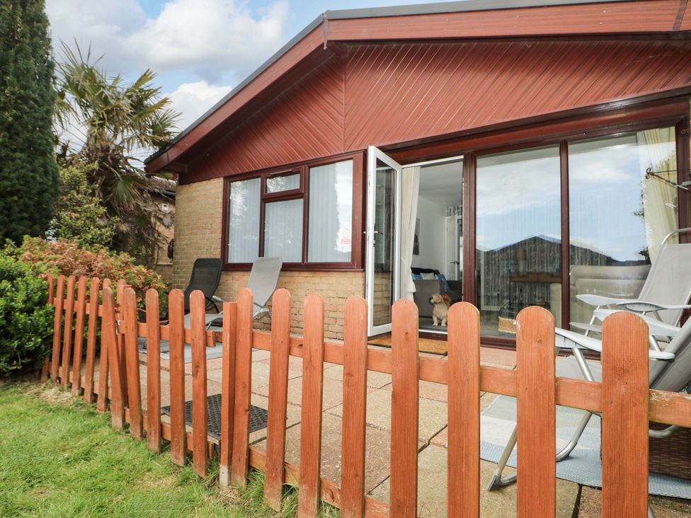 An outdoor patio area with a fence at 38 St Margarets
