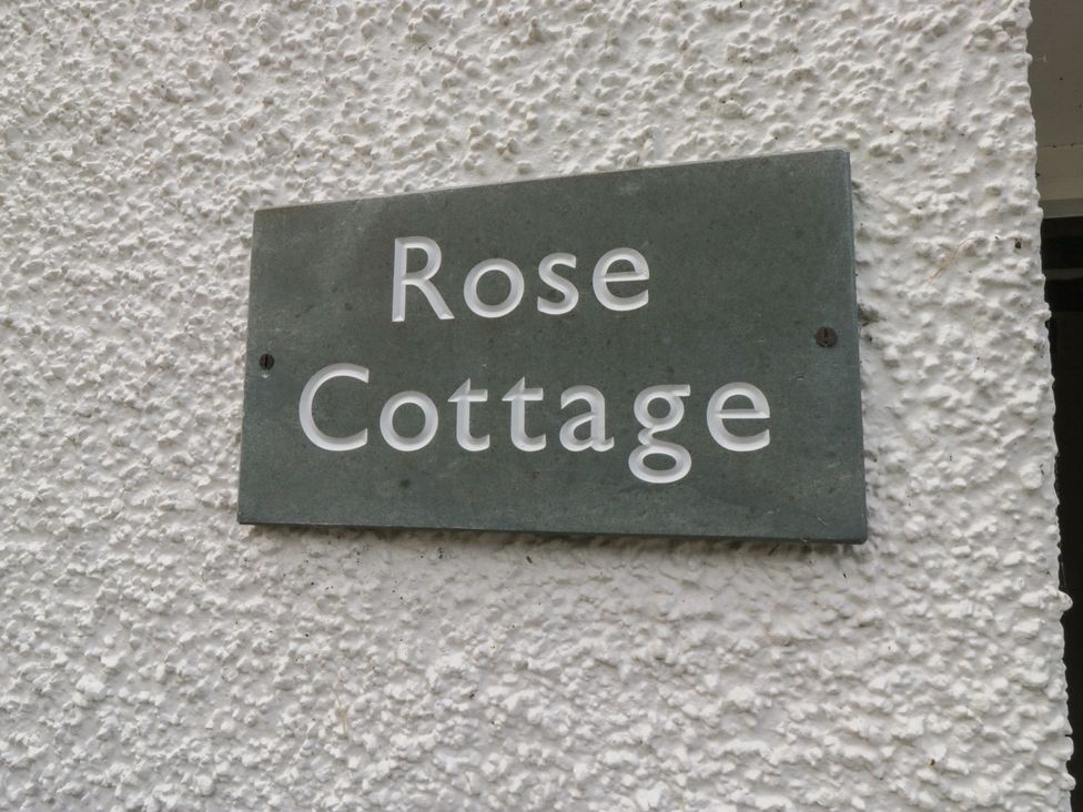 A sign reading Rose Cottage at Rose Cottage in Broughton-In-Furness