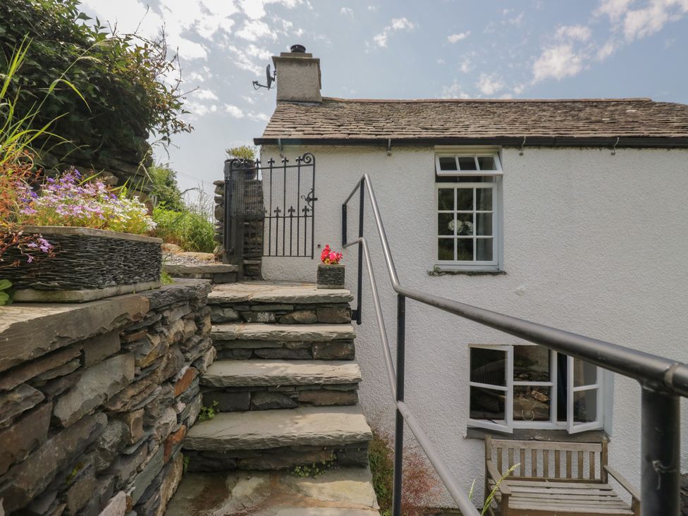 Steps leading to a gated entrance at Rose Cottage in Broughton-In-Furness