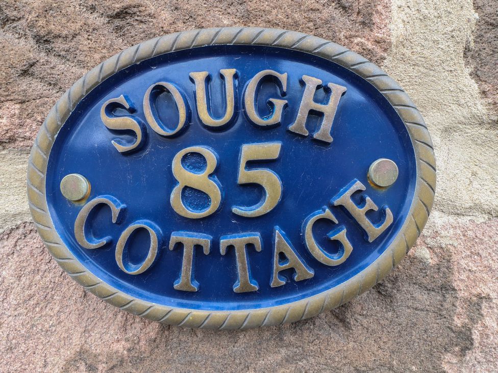 A plaque with the name and number at The Hill in Cromford