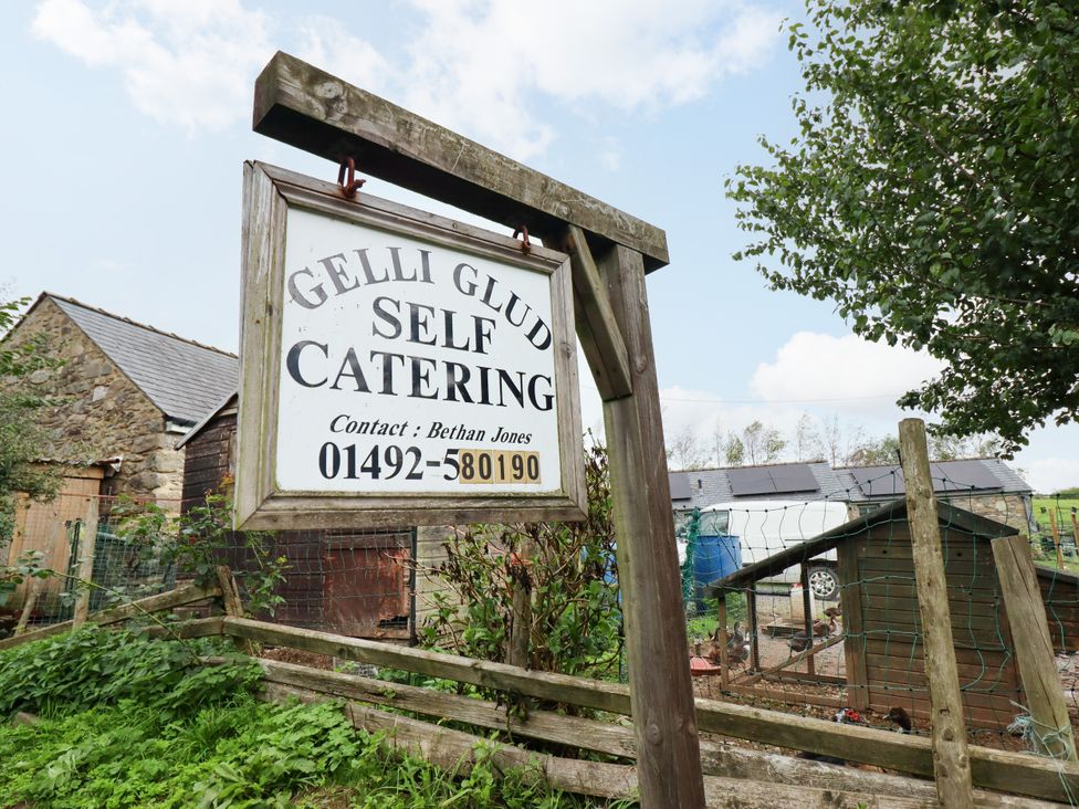 A sign for Gelli Glud self catering at Gelli Glud in Eglwysbach