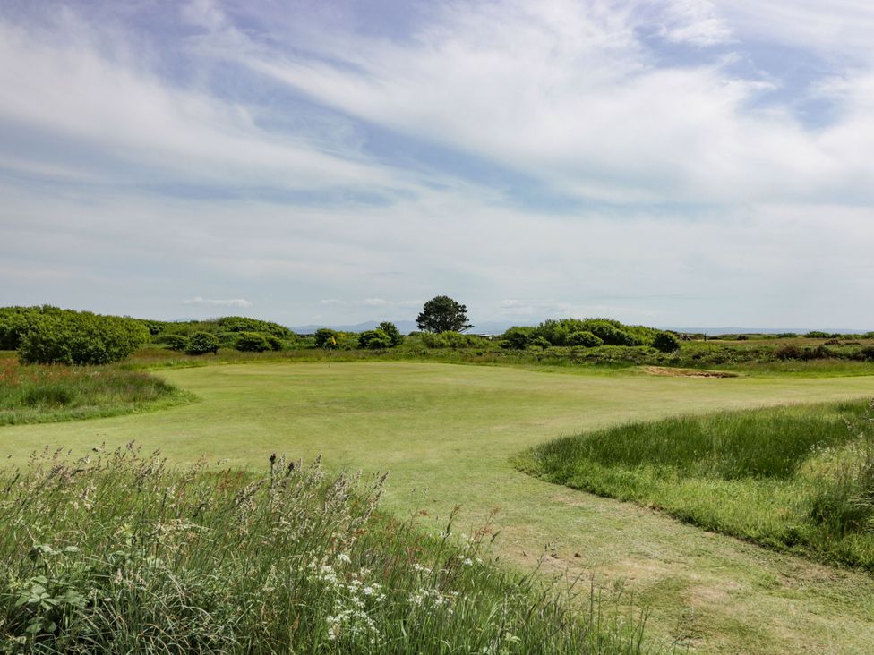 A golf course surrounded by greenery at Mardan in Southerness