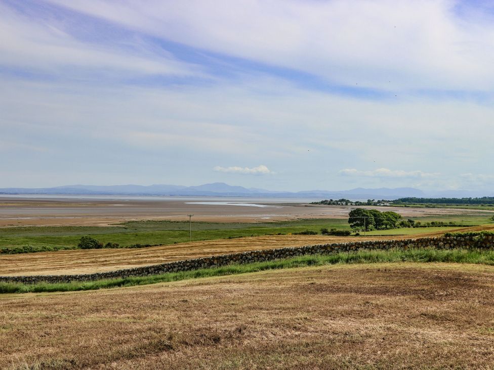 A landscape view with fields and water at Mardan in Southerness