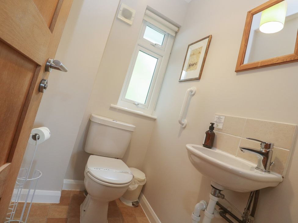 A bathroom with sink and toilet at The Meadow in Feock near Carnon Downs