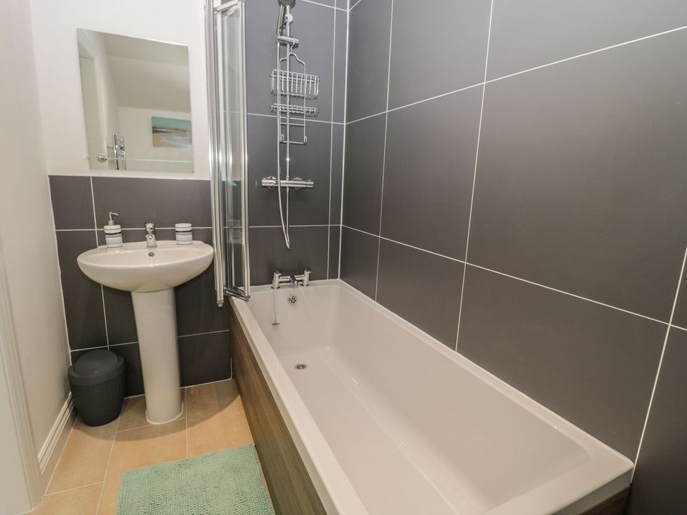 A bathroom with a shower and sink at The Turnip Barn in 