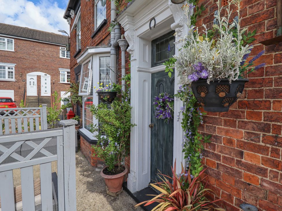 An entrance with a door and plants at 1 The Bays in Burgh Le Marsh