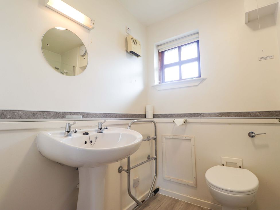 A bathroom with a sink and toilet at Church House Poolewe