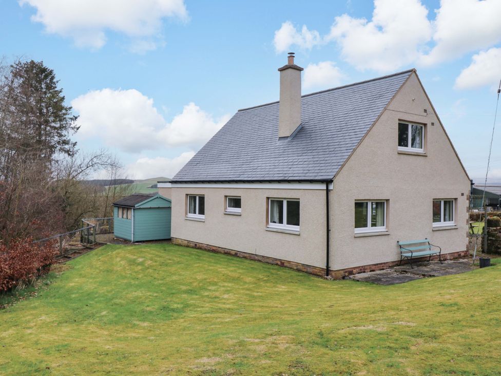 A house with a garden and a shed at Falla Farmhouse in Jedburgh