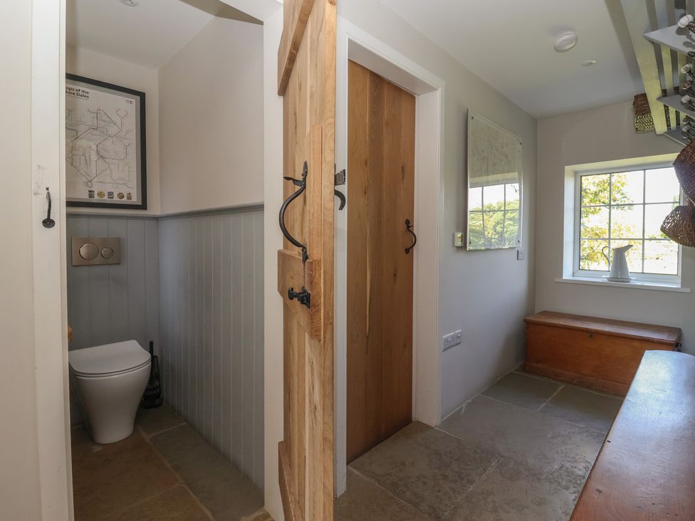 A bathroom with toilet and sink at Lyndhurst in Carlton-in-Coverdale, near Leyburn