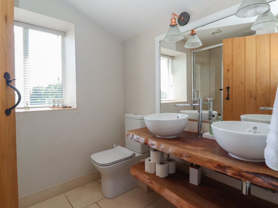 A bathroom with a sink and toilet at Lyndhurst, Carlton-in-Coverdale, near Leyburn