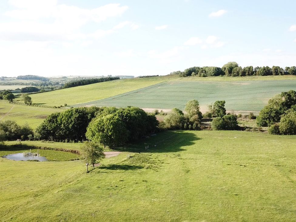 A landscape with fields and trees at Gables Cottage in Market Rasen