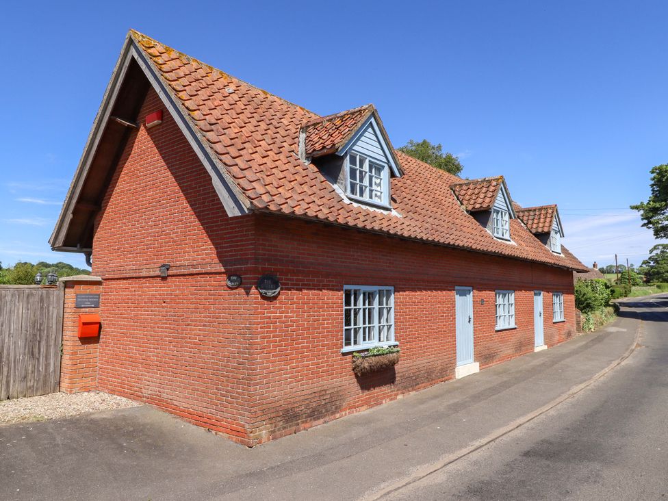 A house with a pitched roof and windows at Gables Cottage in Market Rasen